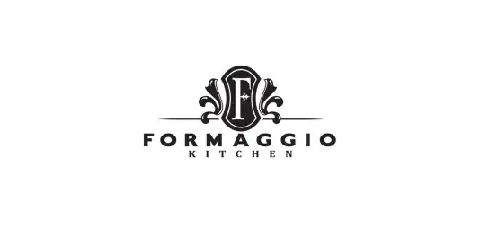 Logo for Formaggio Kitchen. Text reads "FORMAGGIO KITCHEN"