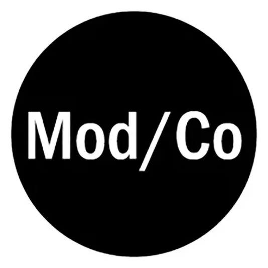 Logo for Modern and Contemporary Membership Program (MOD/CO) museums. White text reads "Mod/Co"