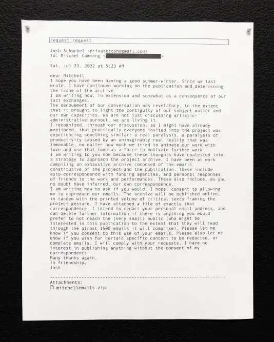 A printout of an email on white paper, secured to a dark surface with two pushpins. The email, dated July 23, 2022, is from Josh Schwebel to Mitchel Cumming discussing a project archive, burnout in the art sector, and a request to reproduce their email correspondence for the archive.
