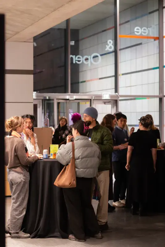 Attendees congregating in the atrium for the Connect at the List event in the MIT List Visual Arts Center.