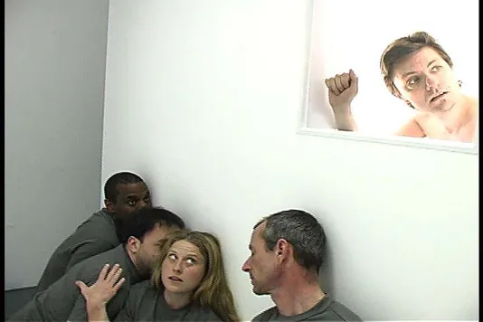 4 performers looking surprised in a video performance