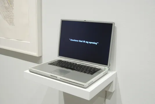 Laptop with black screen sits on a shelf. Screen reads "Structures that fit my opening." 
