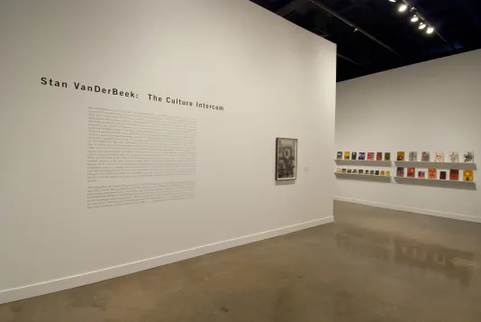 A photo of the wall text and entrance to the gallery