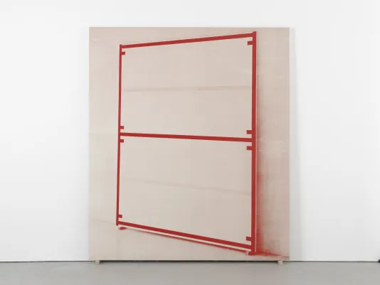 Large silkscreen of a leaning, angled canvas edged and bisected with a uniform red line leans against the wall.