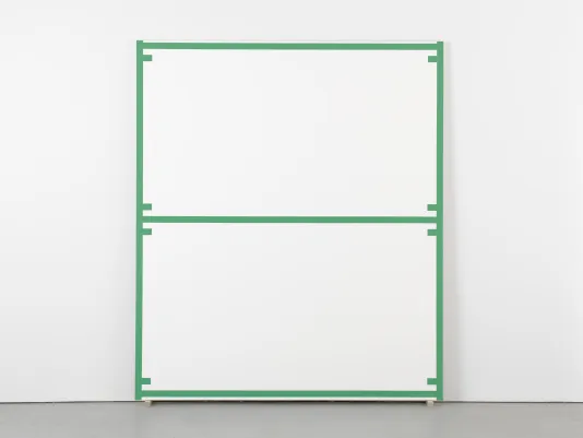 Large canvas edged and bisected with a uniform green line, as well as 8 evenly spaced short lines, leans against a wall.