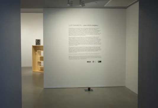 A gallery wall features vinyl text that reads "List Projects Lina Viste Grønli".