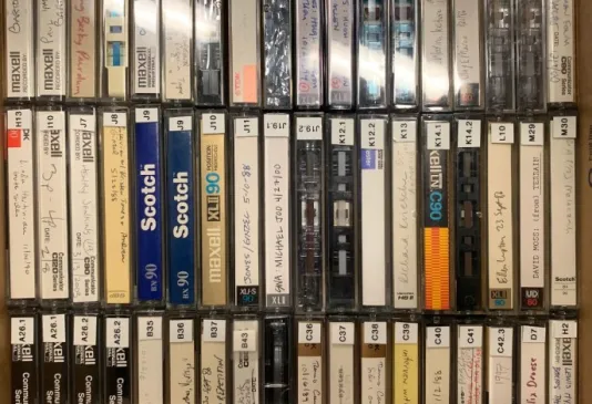 A display of various archival cassette tapes from the List Center.