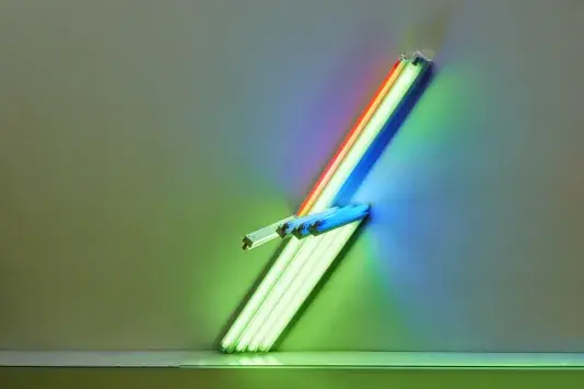 An installation by Dan Flavin consists of parallel LED light beams.