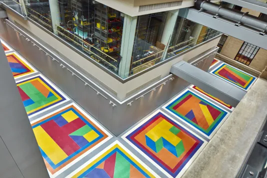 Sol Lewitt's colorful Terrazzo floor including red, green, orange, purple, and yellow tiles.