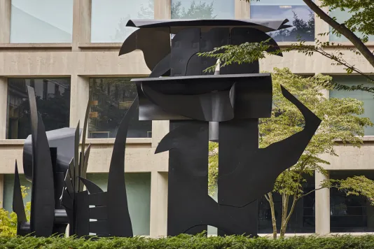 Welded Cor-Ten steel sculpture featuring a combination of rigid and organic shapes