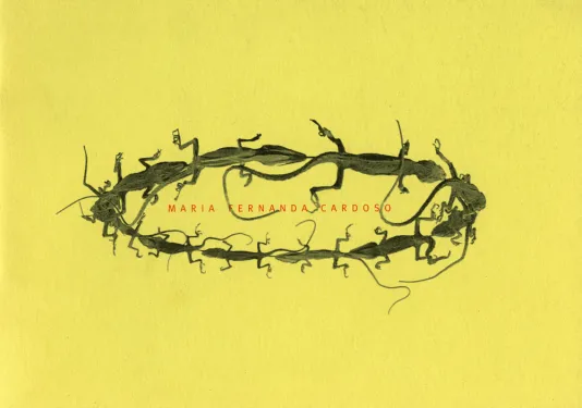 Yellow book cover for Maria Fernanda Cardoso featuring the artists name in the center surrounded by an oval of frogs attacked to one another.