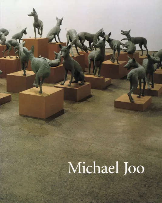 Book cover for Michael Joo featuring an image of Joo's animal sculptures lined up next to one another.