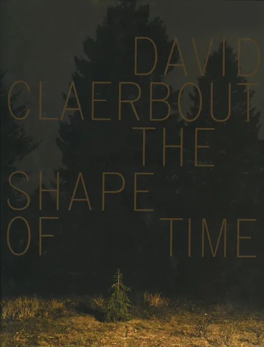Book cover for David Claerbout: The Shape of Time featuring a dark photograph of a small pine tree surrounded by the shadows of much larger trees.