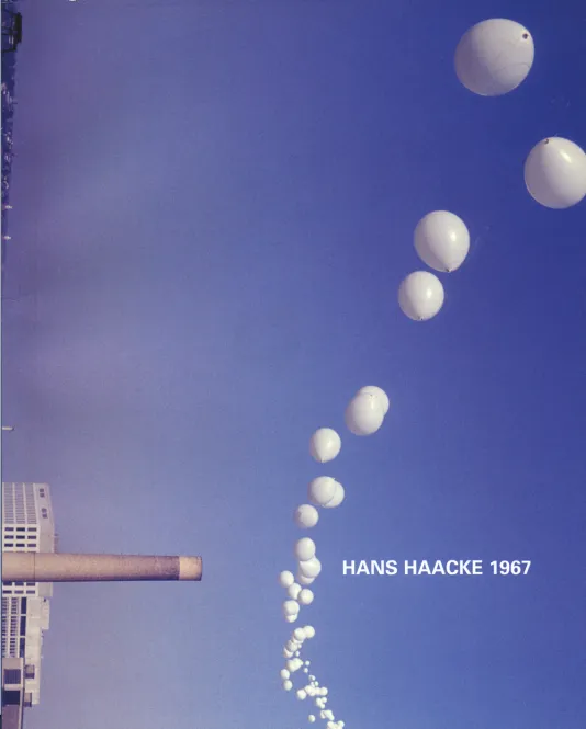 Book cover for Hans Haacke 1967 featuring a skyline photo of buildings at MIT, a clear blue sky and a string of large white weather balloons floating into the distance.