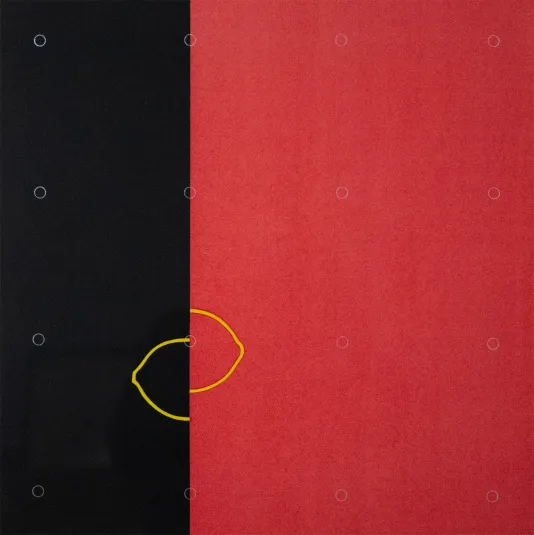 Black rectangle on the left and a red large rectangle on the right with the outline of a yellow lemon where the two rectangles meet.