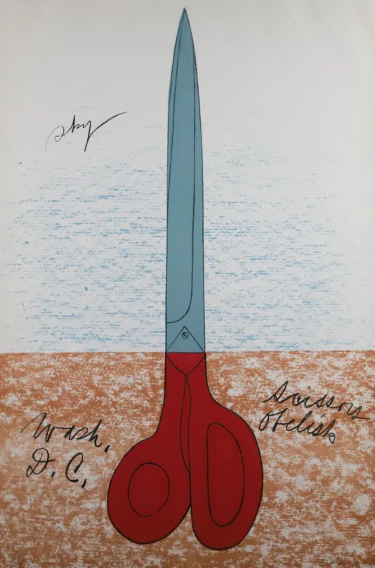 A pair of red and silver scissors on a brown and blue background.