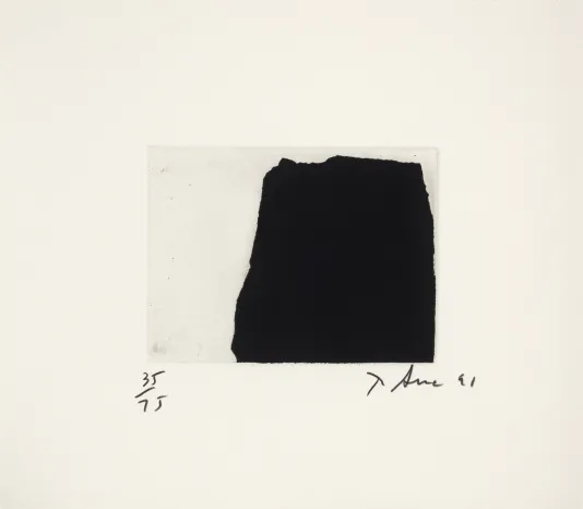 Black abstract shape resembling a cliff on the right of a white piece of paper in a large frame with the artist's signature in the lower right corner.