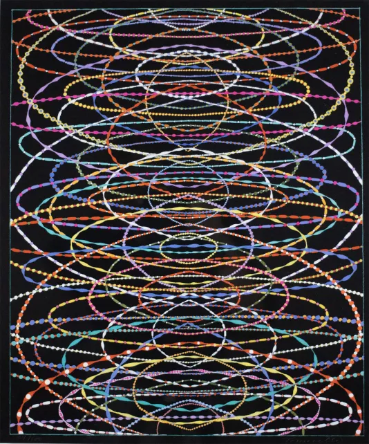 Black background with colorful circular rings filling the frame.