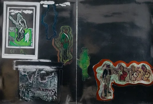 Prints stuck to a black metal cabinet of soldiers and an army.