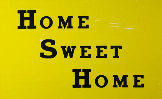 Yellow background with text that reads "Home Sweet Home."