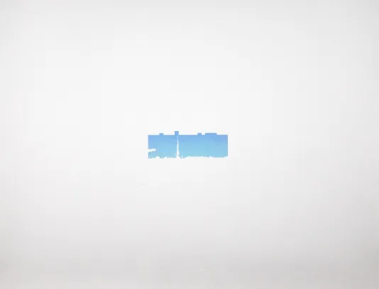 Small rectangular blue shape with jagged edges in the center of a large white plane.