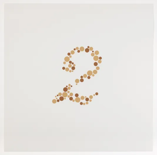 The number two made up of small beige and burnt orange circles of varying sizes.