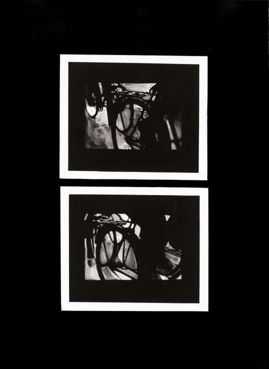 Two black and white images stacked vertically of close up shots of a bike wheel.