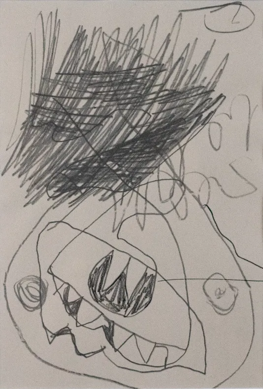 Pencil sketch featuring dark scribbles on top and a distorted creatures face on the bottom.