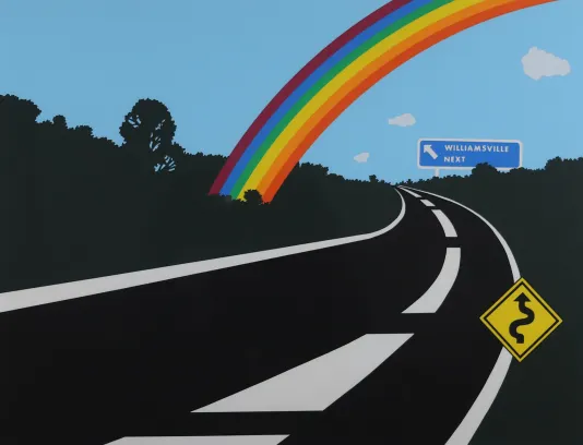 A black winding road with a small street sign on the right and a colorful rainbow going from the center to the right edge.