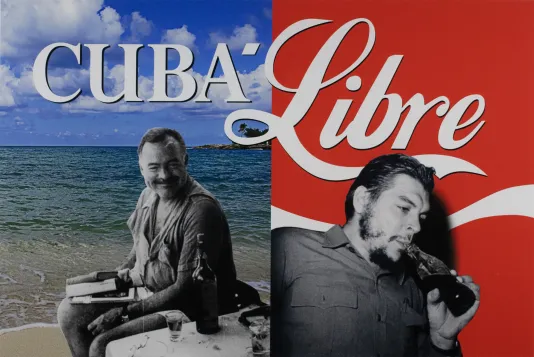 On the left is a black and white image of a man sitting at a table pasted onto a picture of the beach with the word Cuba above his head and on the right is a man drinking a bottle of coke with the word Libre written above him.