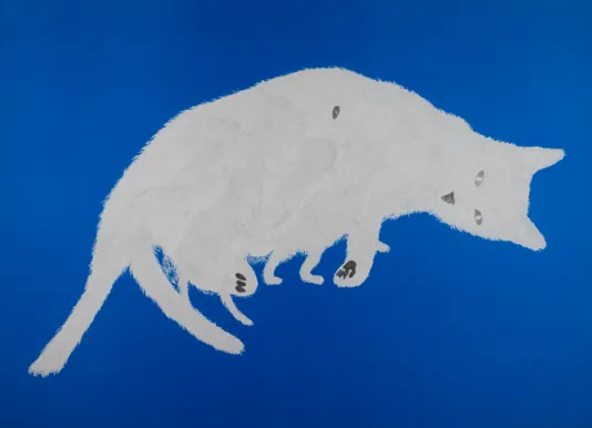 Blue background with a large cat painted in white hunched over sideways.
