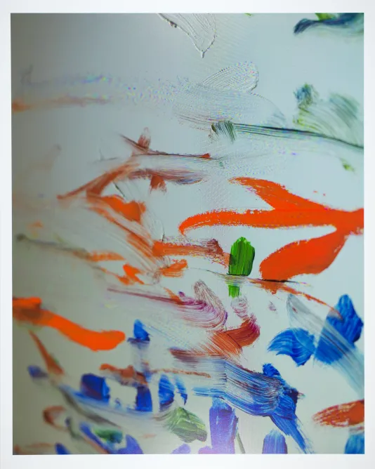 Abstract painting featuring orange brushstrokes, blue dots, and green markings.