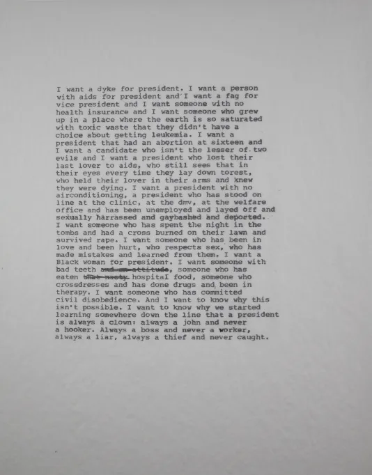 Large paragraph of text written on a white piece of paper.